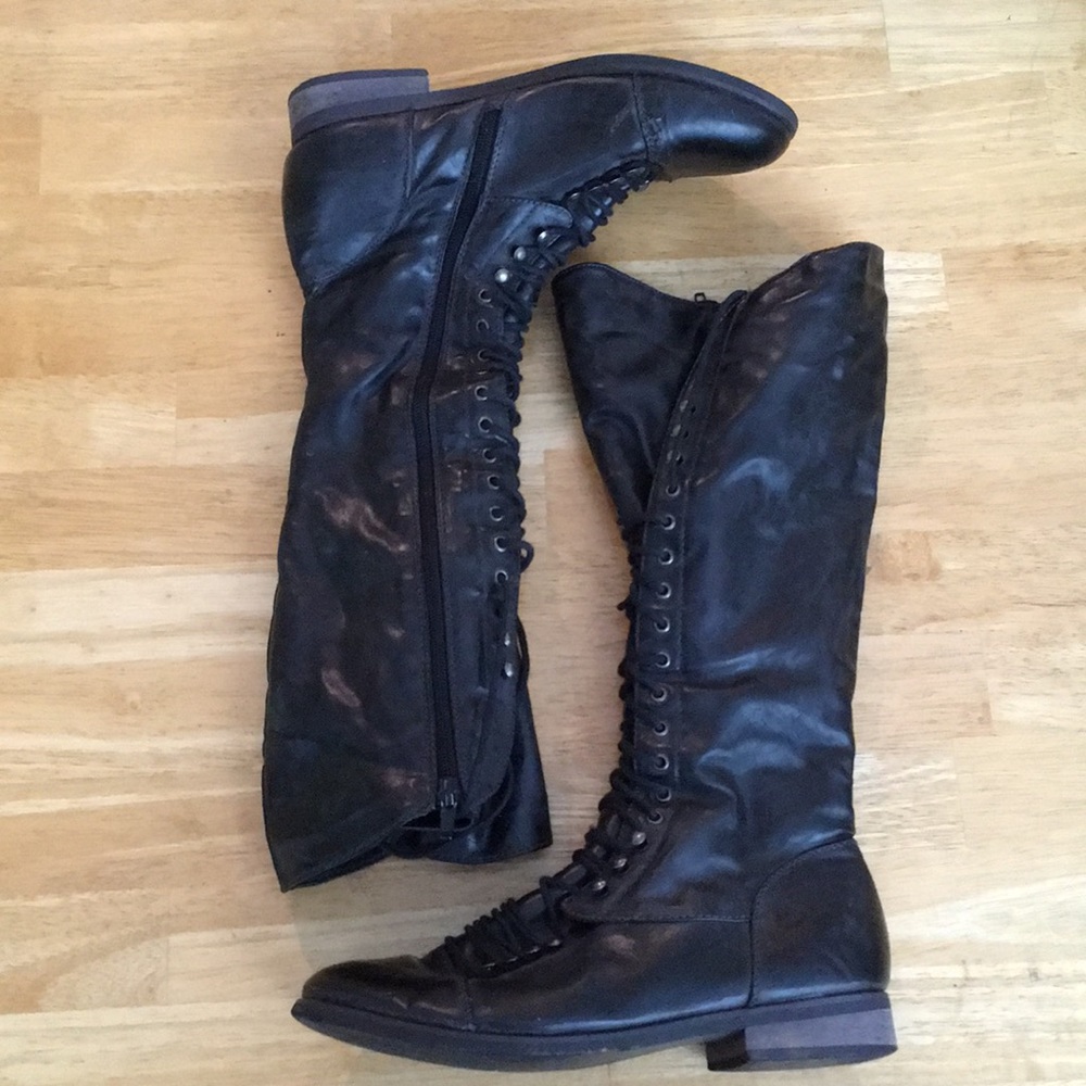 Tall black faux leather lace-up boots